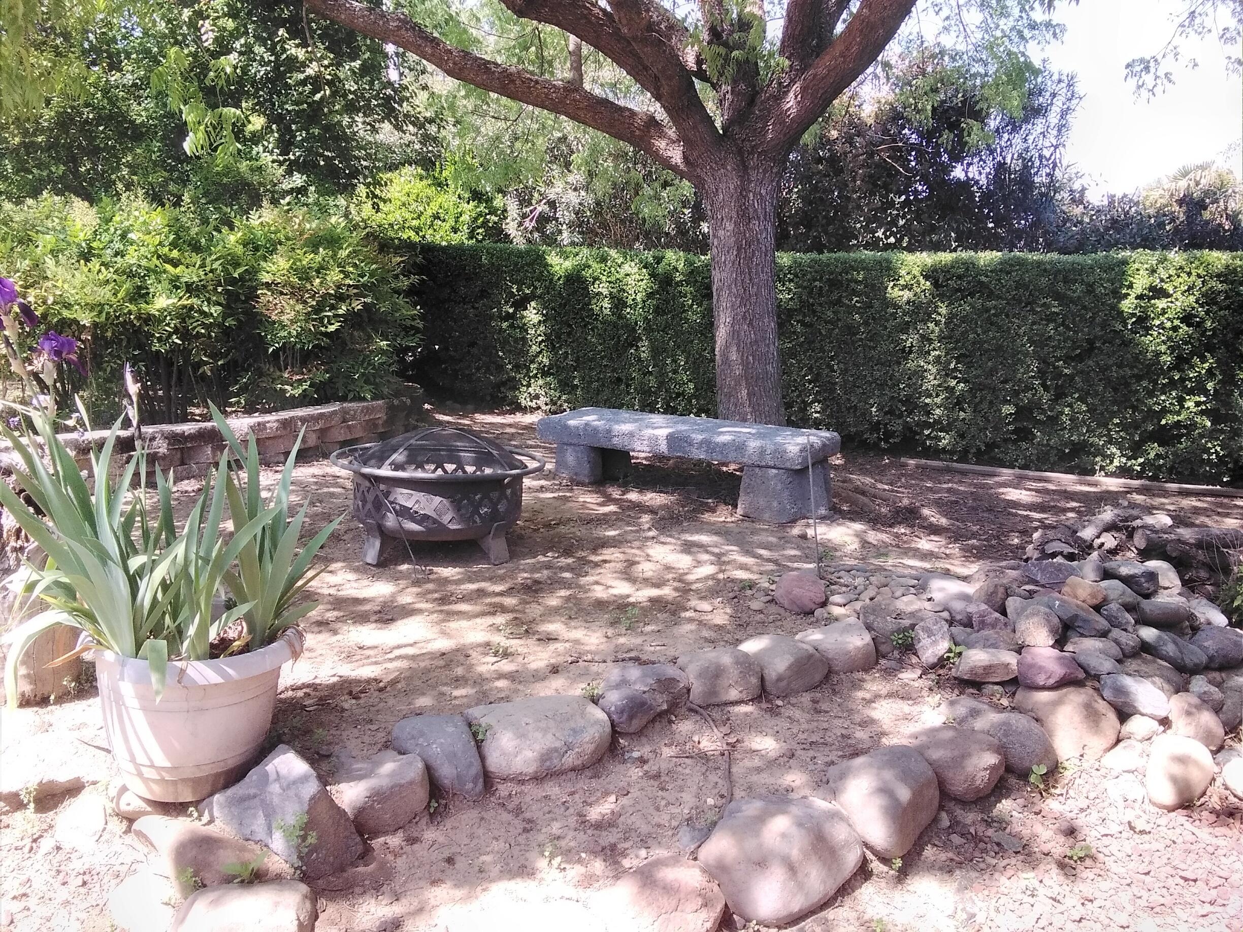 15560 China Rapids Drive Red Bluff, CA 96080 - Photo 43 of 43 a view of a backyard with sitting area