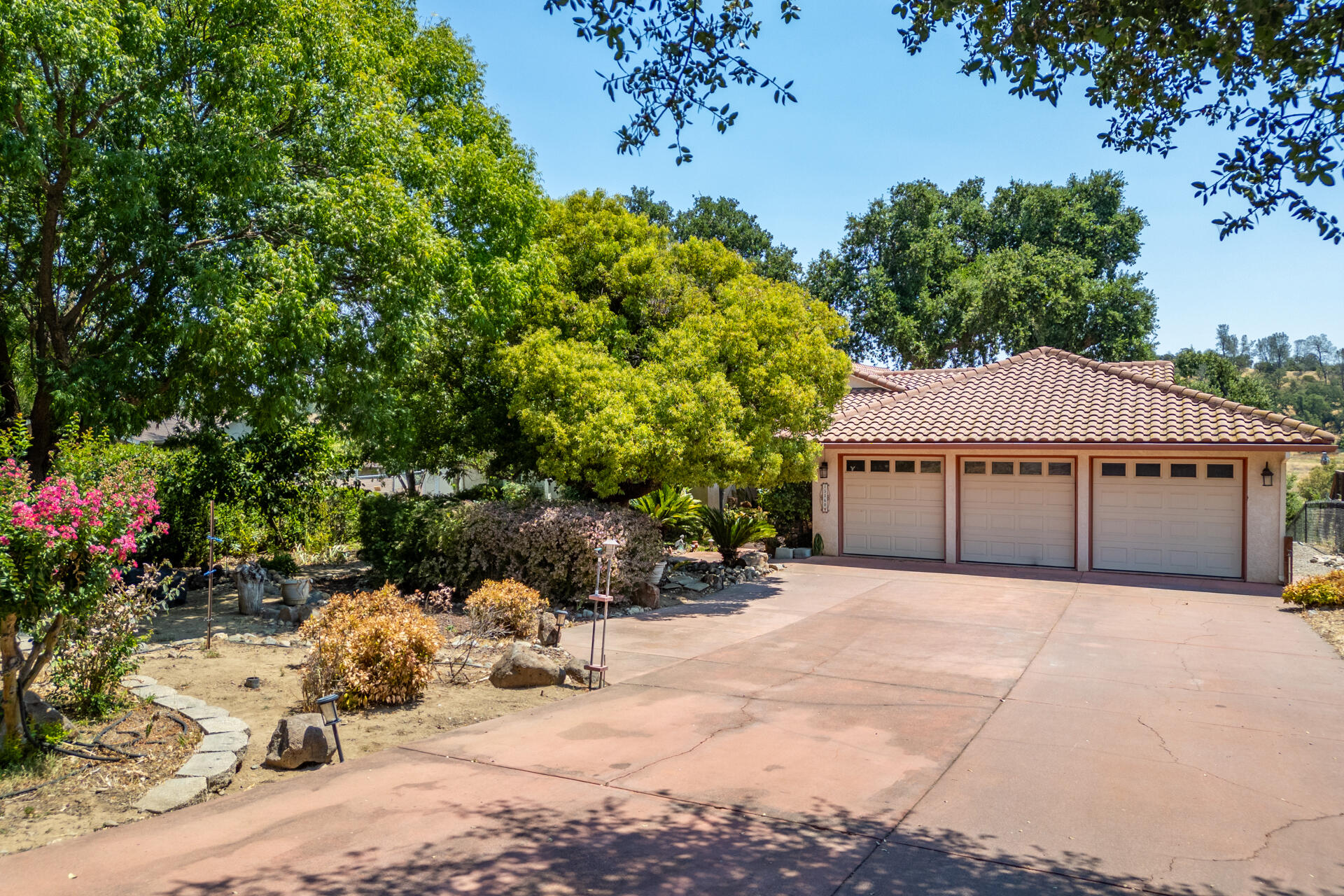 15560 China Rapids Drive Red Bluff, CA 96080 - Photo 10 of 43 a view of a house with a yard