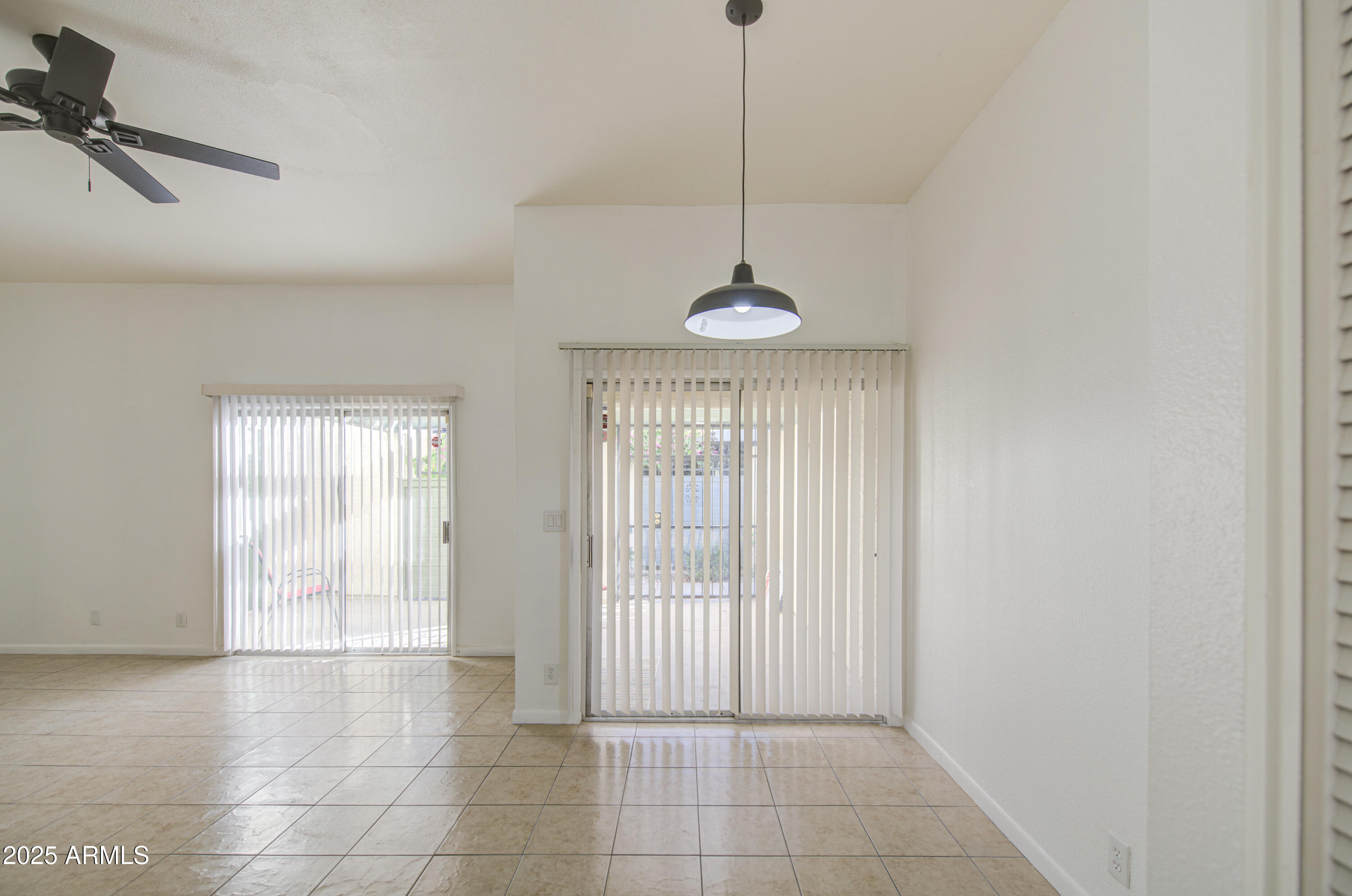 712 South Lebanon Lane Tempe, AZ 85288 - Photo 4 of 35 a view of an empty room with a window