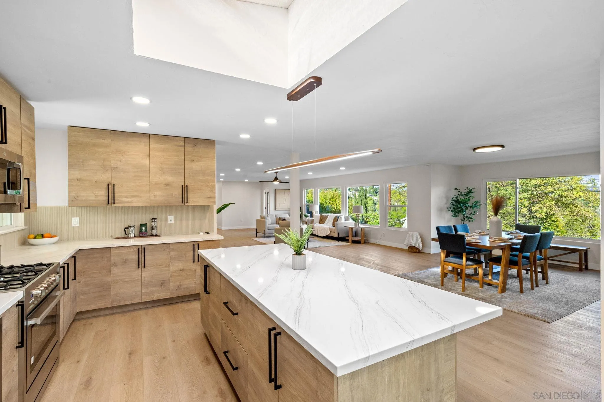 10104 Cristobal Drive Spring Valley, CA 91977 - Photo 20 of 56 a large kitchen with kitchen island a large island in it