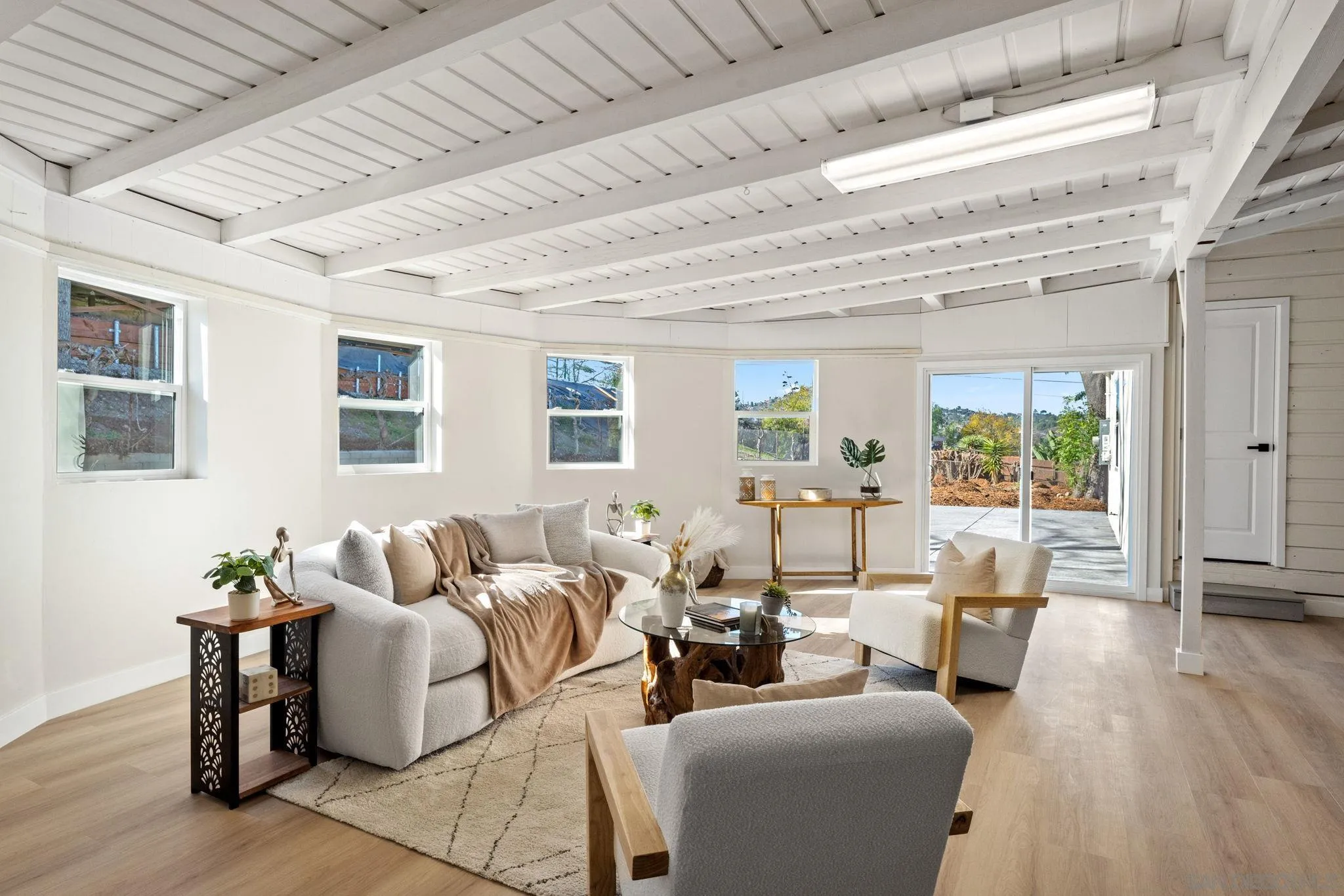 10104 Cristobal Drive Spring Valley, CA 91977 - Photo 39 of 56 a living room with furniture and wooden floor