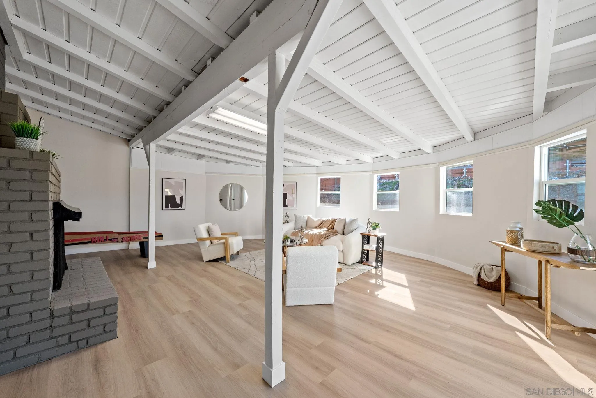 10104 Cristobal Drive Spring Valley, CA 91977 - Photo 40 of 56 a living room with furniture and wooden floors