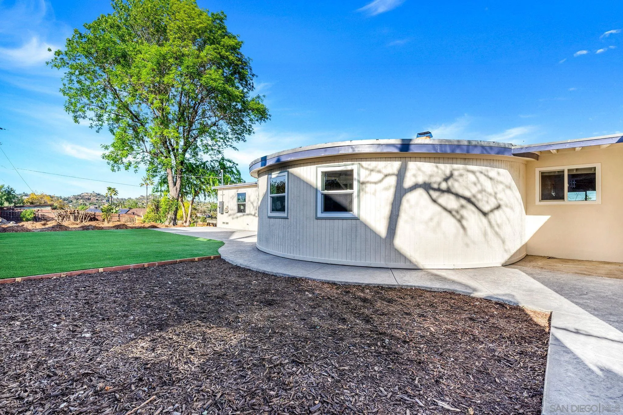 10104 Cristobal Drive Spring Valley, CA 91977 - Photo 42 of 56 a view of a house with a yard