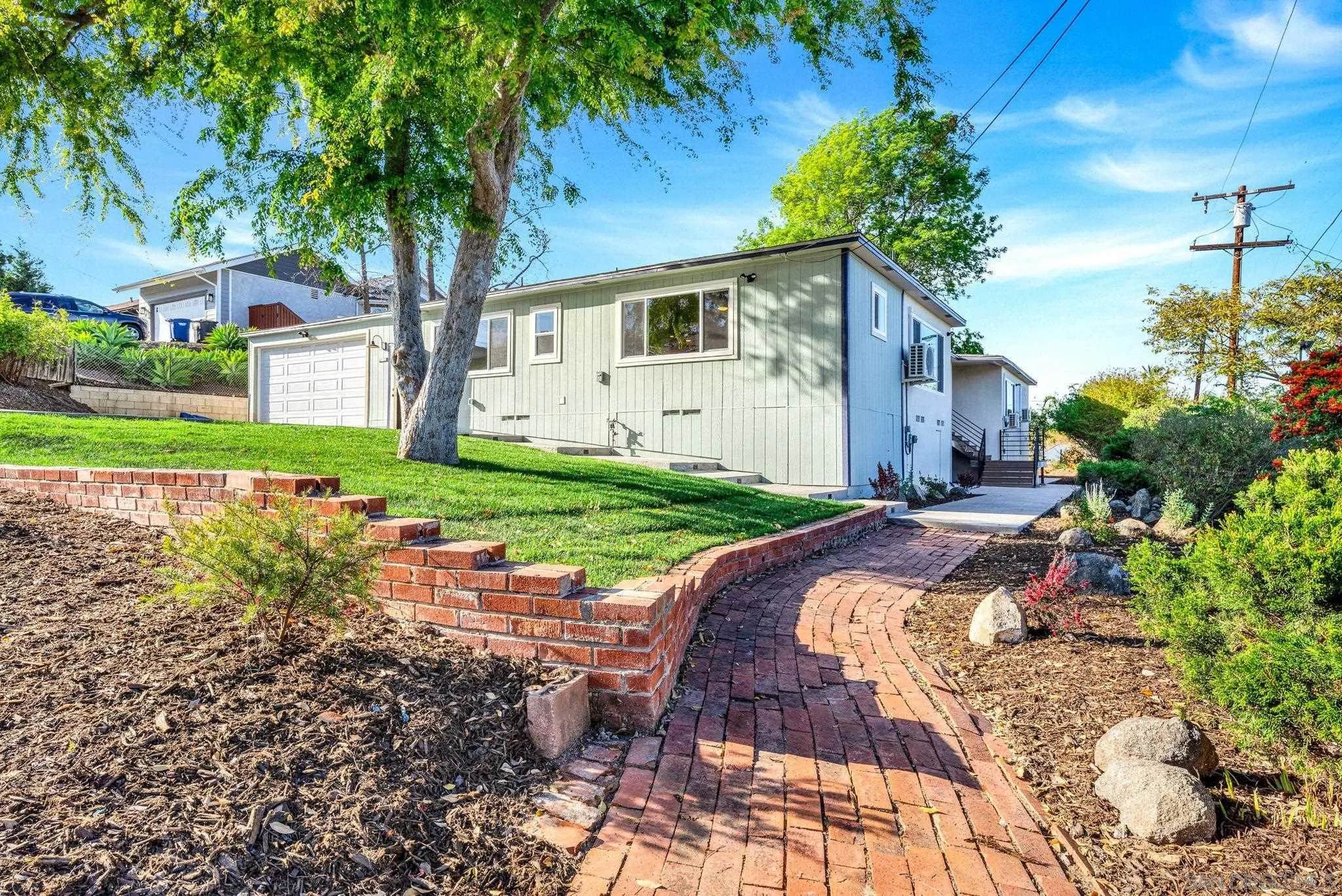 10104 Cristobal Drive Spring Valley, CA 91977 - Photo 47 of 56 a view of backyard with a garden and plants