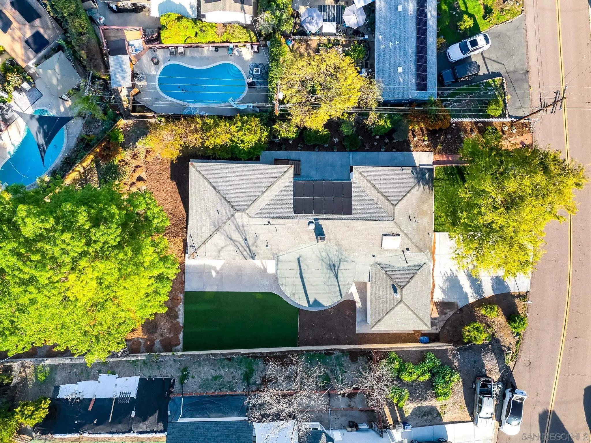 10104 Cristobal Drive Spring Valley, CA 91977 - Photo 52 of 56 an aerial view of a house with a yard and garden