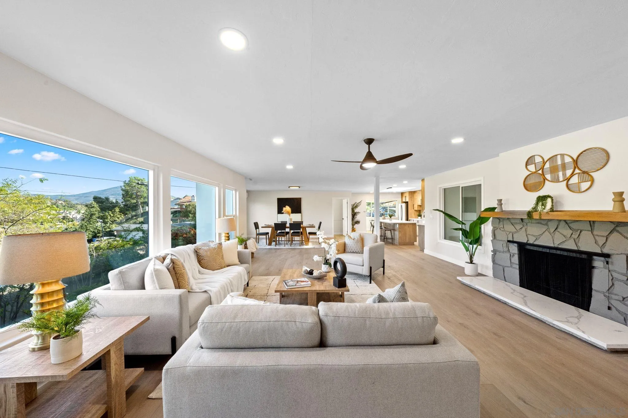 10104 Cristobal Drive Spring Valley, CA 91977 - Photo 6 of 56 a living room with fireplace furniture and a fireplace