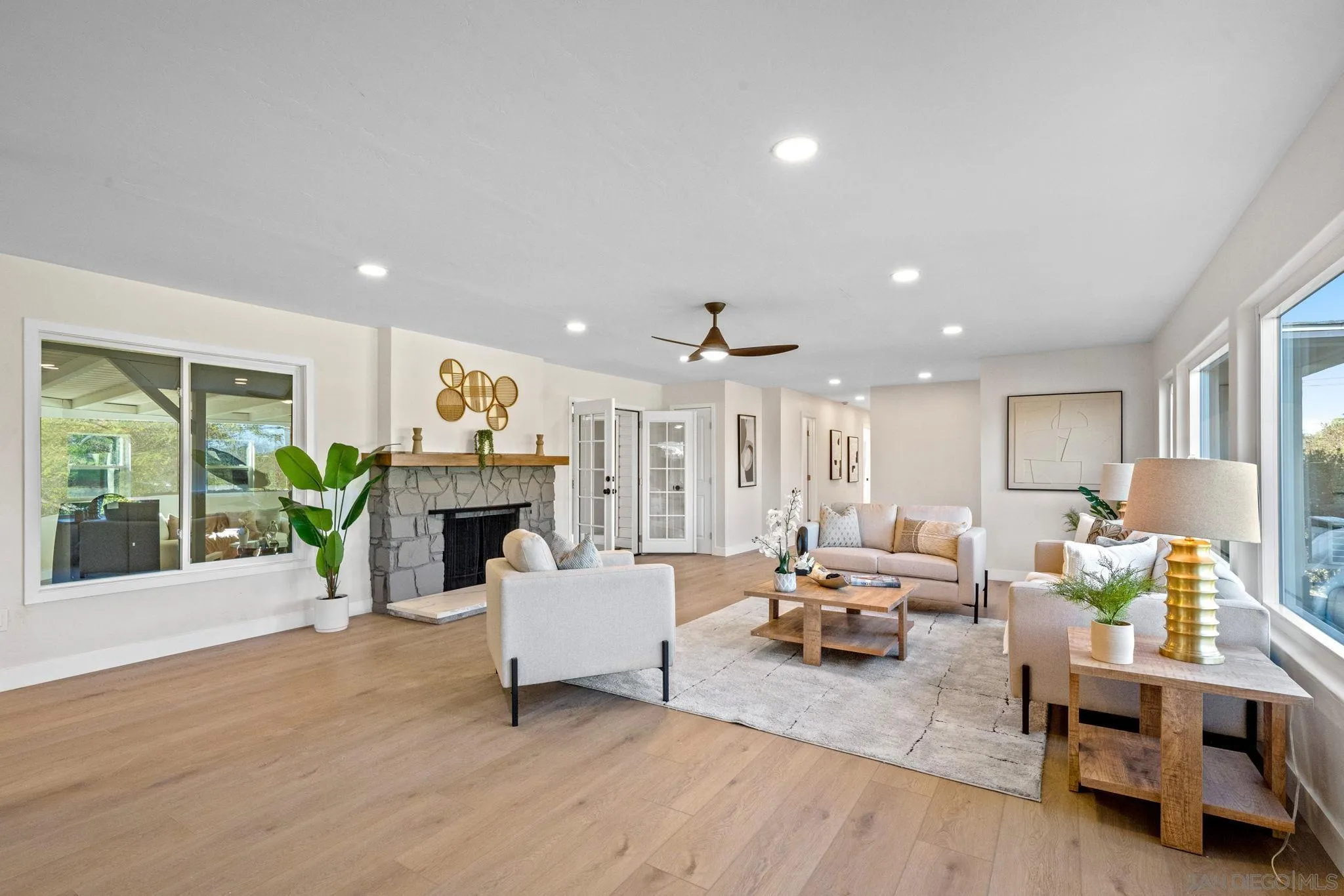 10104 Cristobal Drive Spring Valley, CA 91977 - Photo 9 of 56 a living room with furniture and a fireplace