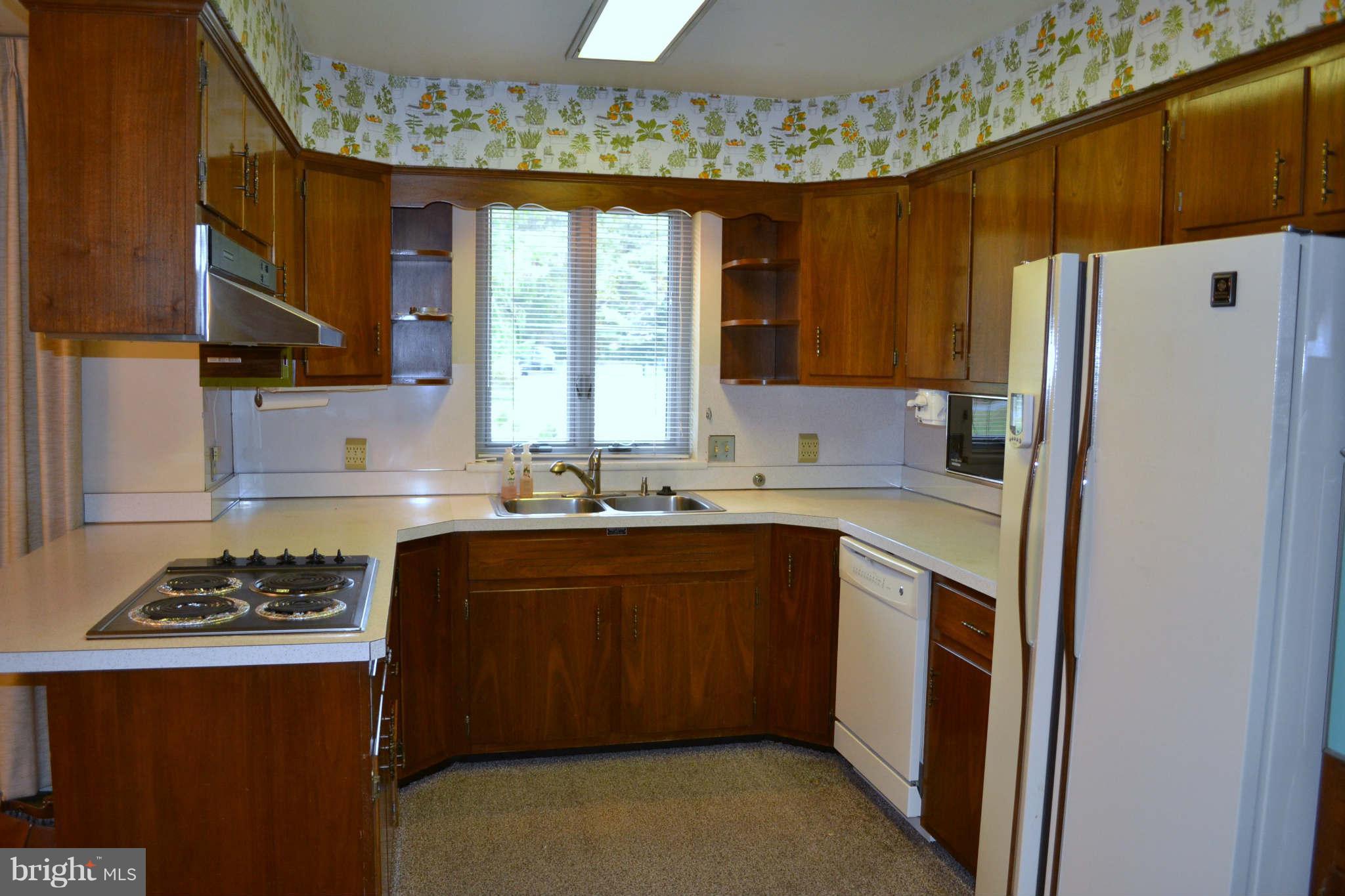 1904 Merrifields Drive Silver Spring, MD 20906 - Photo 3 of 16 Kitchen is open to the dining room