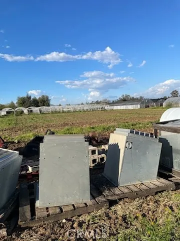 a view of a backyard of the house