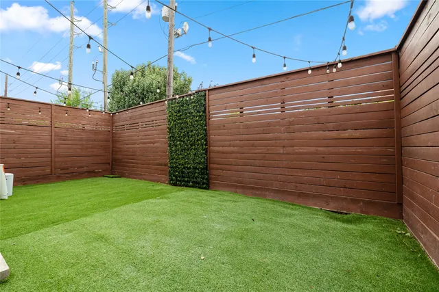 a view of a back yard of the house