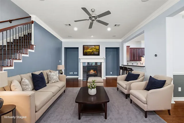 a living room with furniture a fireplace