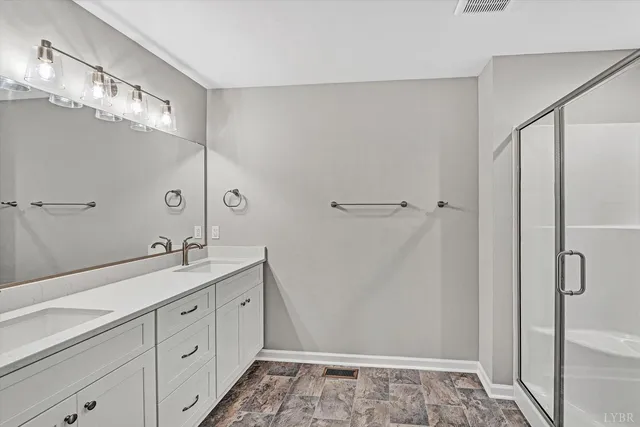 a bathroom with a shower and a toilet