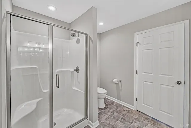 a view of room with wooden floor