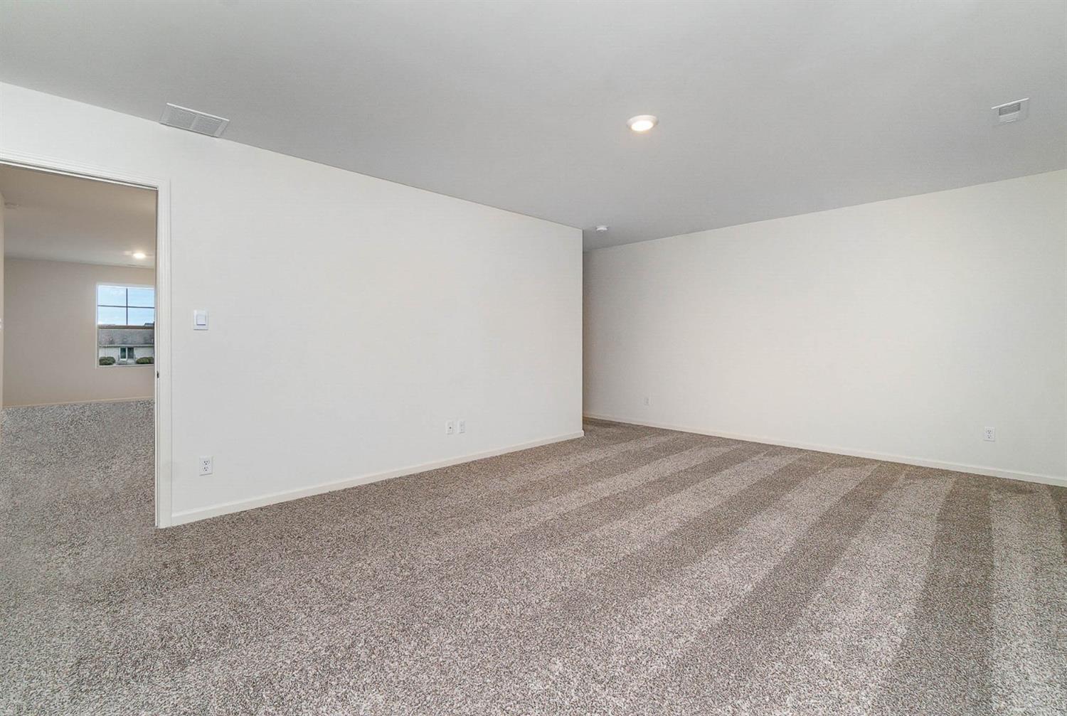 10354 Bryan Place Crown Point, IN 46307 - Photo 13 of 35 an empty room with windows