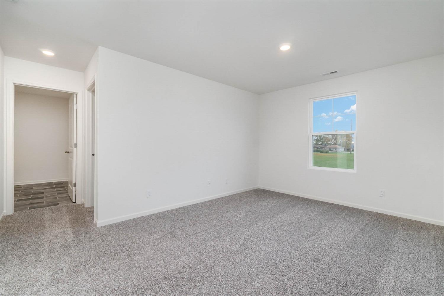 10354 Bryan Place Crown Point, IN 46307 - Photo 15 of 35 an empty room with a window