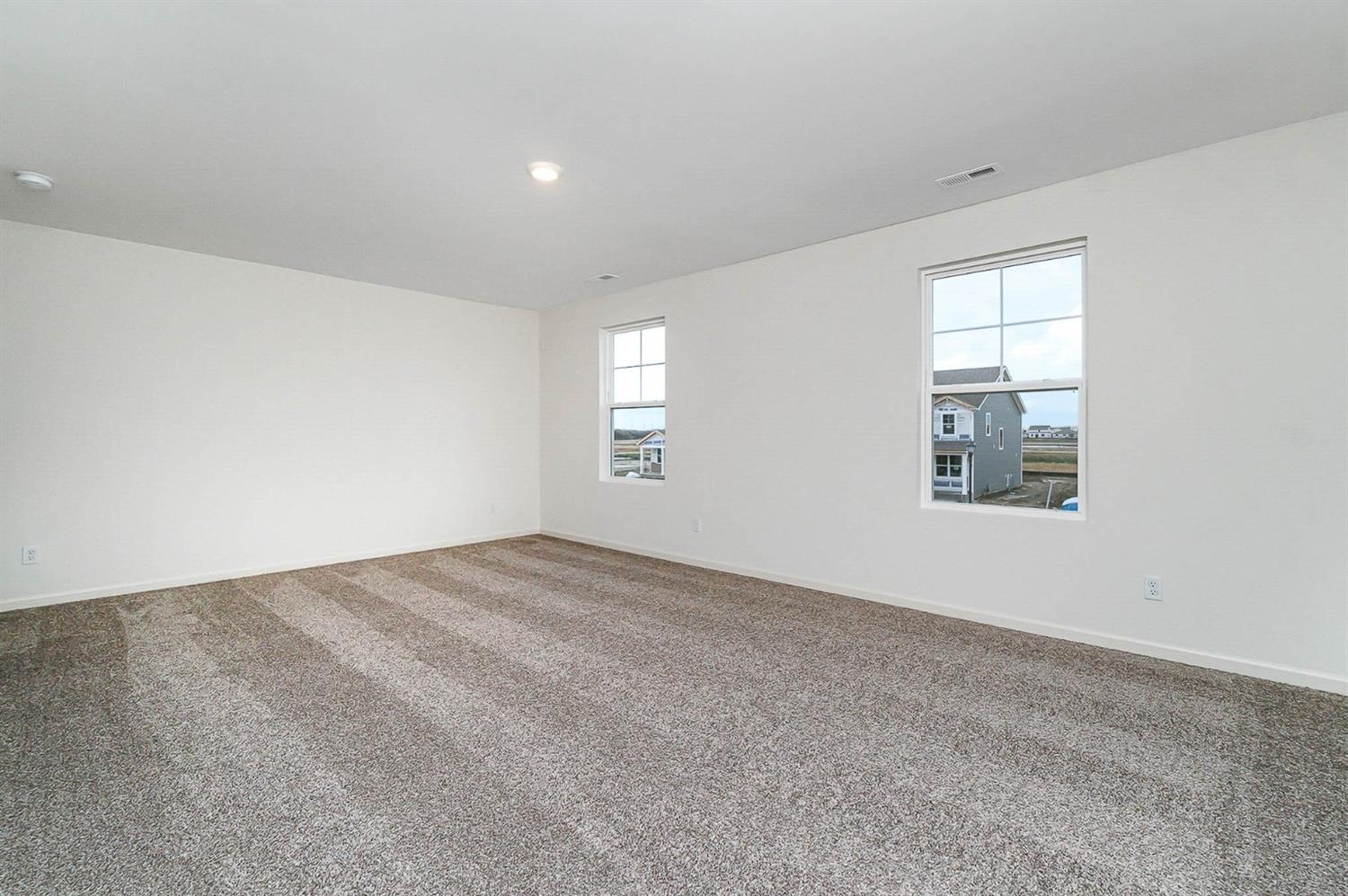 10354 Bryan Place Crown Point, IN 46307 - Photo 19 of 35 an empty room with windows