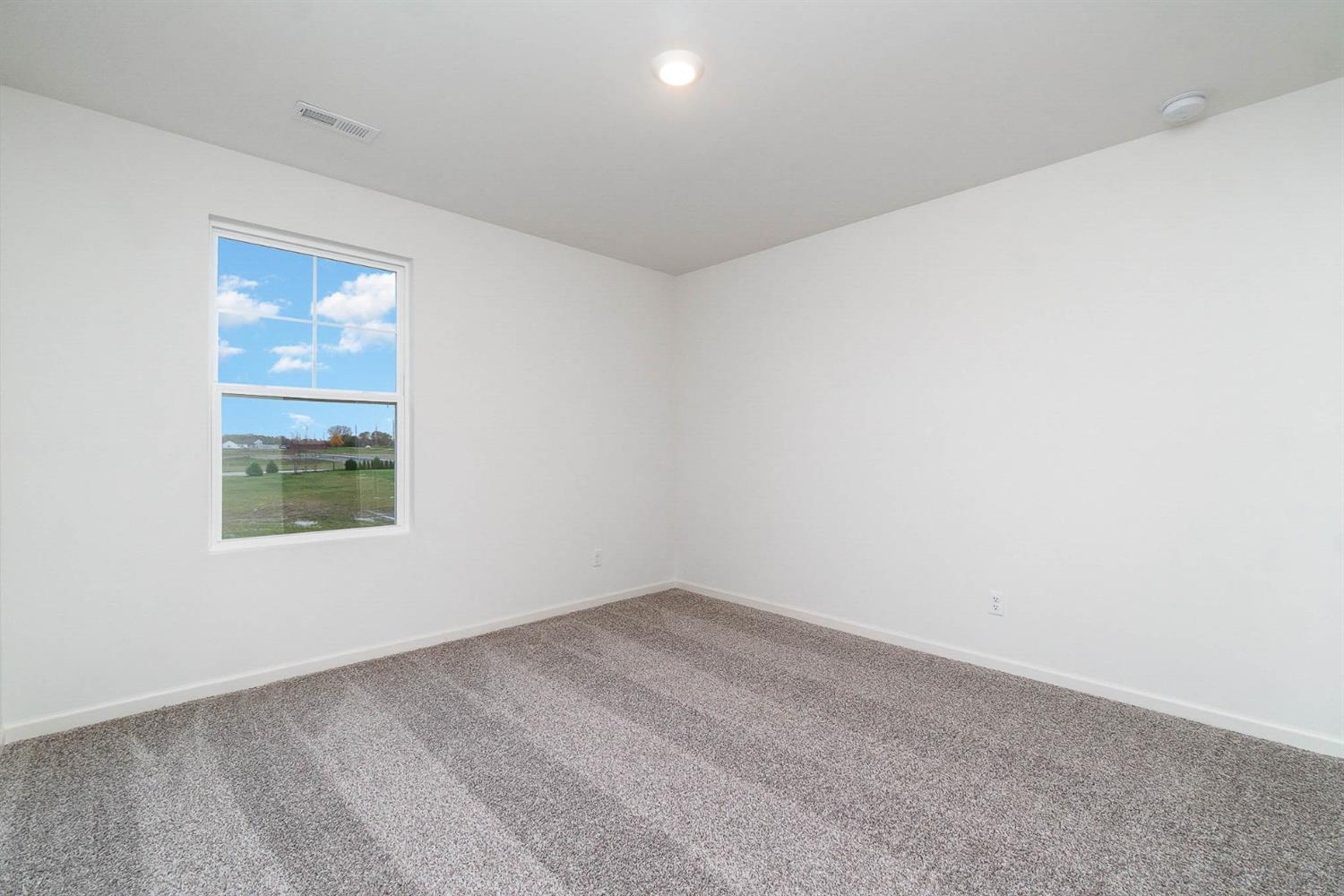 10354 Bryan Place Crown Point, IN 46307 - Photo 22 of 35 an empty room with a window
