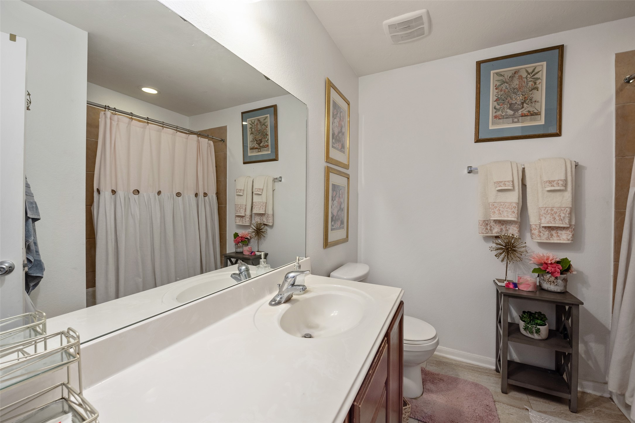 3554 Bennett Trails Drive Spring, TX 77386 - Photo 34 of 44 a bathroom with a sink and a mirror