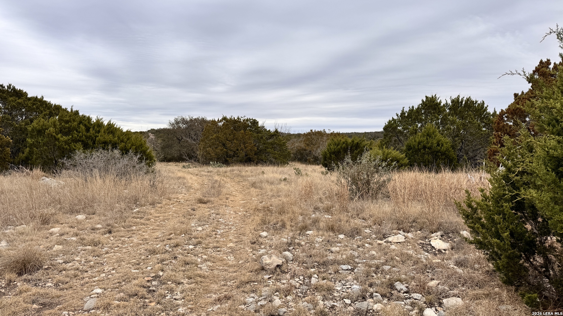 16010 Sd Rocksprings, TX 78880 - Photo 12 of 20 a view of lake with green space