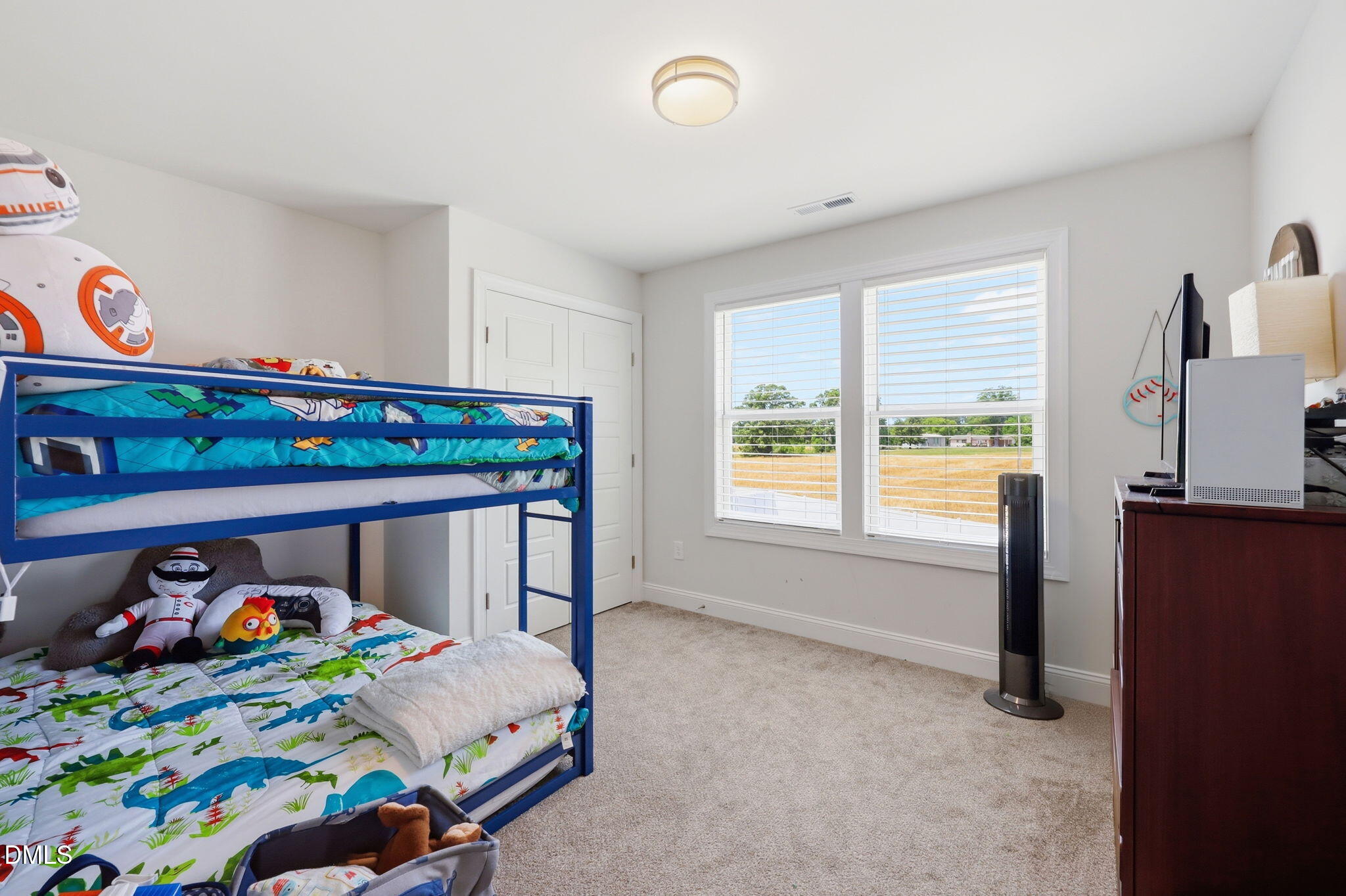 104 Kavanaugh Road Wake Forest, NC 27587 - Photo 20 of 36 a bedroom with a bed and a window