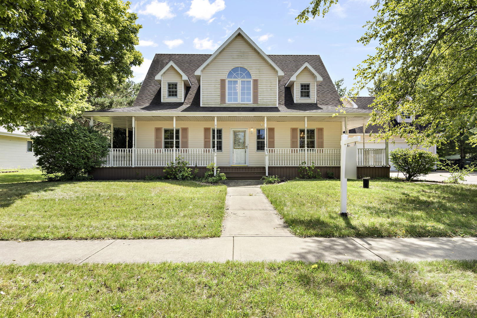 23501 West McClintock Road Channahon, IL 60410 - Photo 1 of 19 a front view of a house with a yard and garage