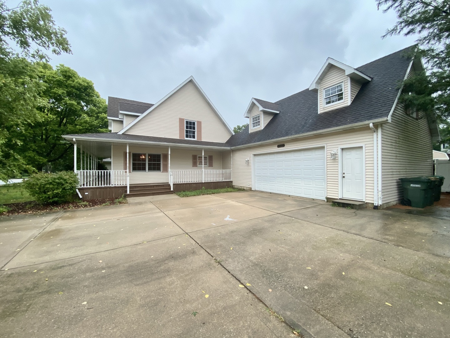 23501 West McClintock Road Channahon, IL 60410 - Photo 2 of 19 a front view of a house with a garage and a yard