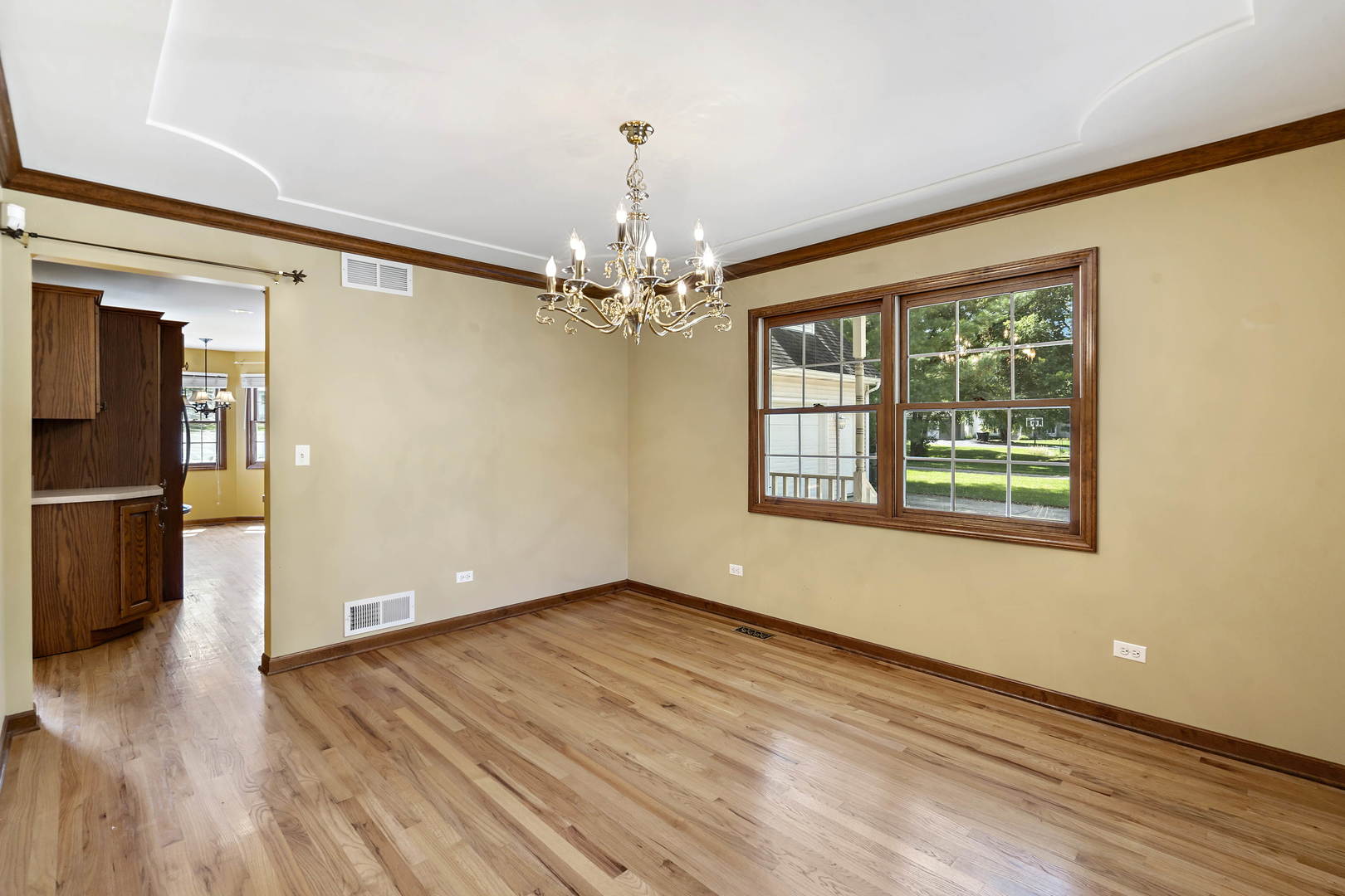 23501 West McClintock Road Channahon, IL 60410 - Photo 4 of 19 a view of livingroom with hardwood floor and window