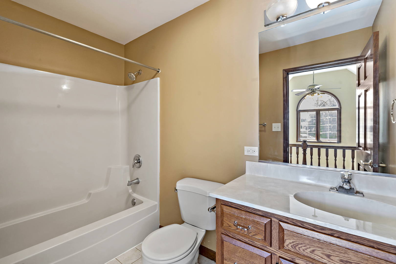 23501 West McClintock Road Channahon, IL 60410 - Photo 10 of 19 a bathroom with a granite countertop sink a toilet and shower