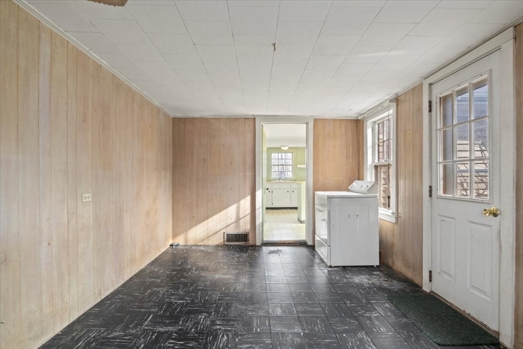600 High Street Westwood, MA 02090 - Photo 12 of 27 a view of kitchen with a sink dishwasher and wooden cabinets