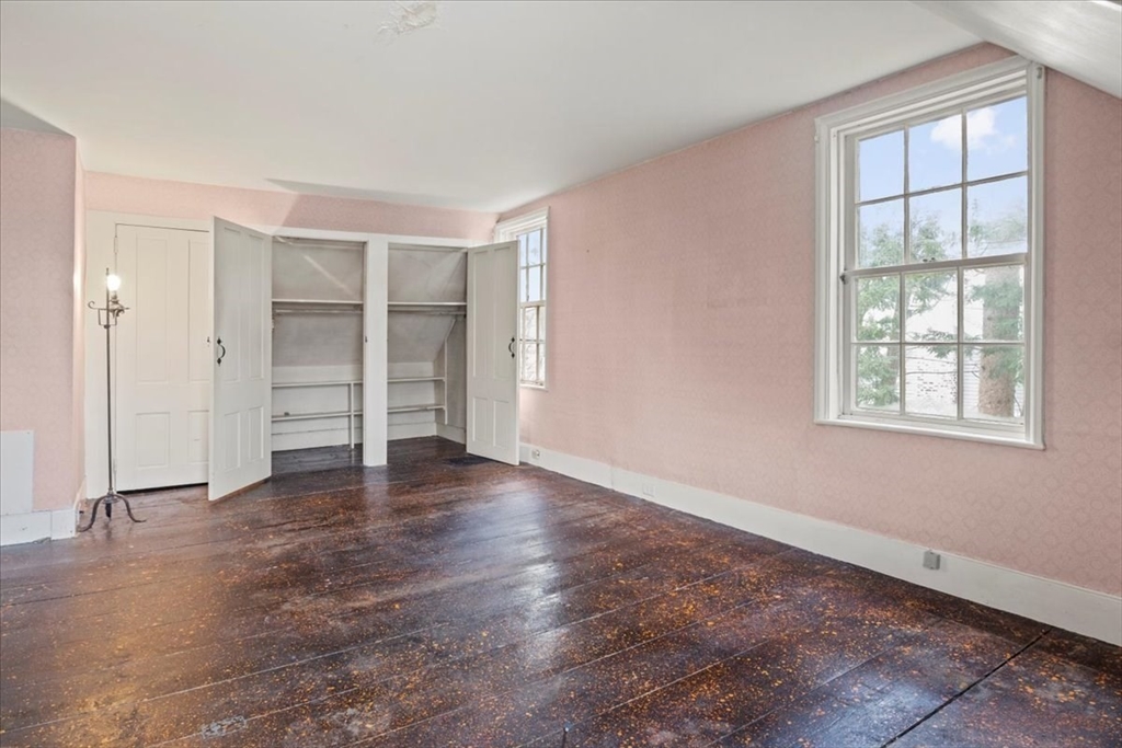 600 High Street Westwood, MA 02090 - Photo 18 of 27 an empty room with closet and windows
