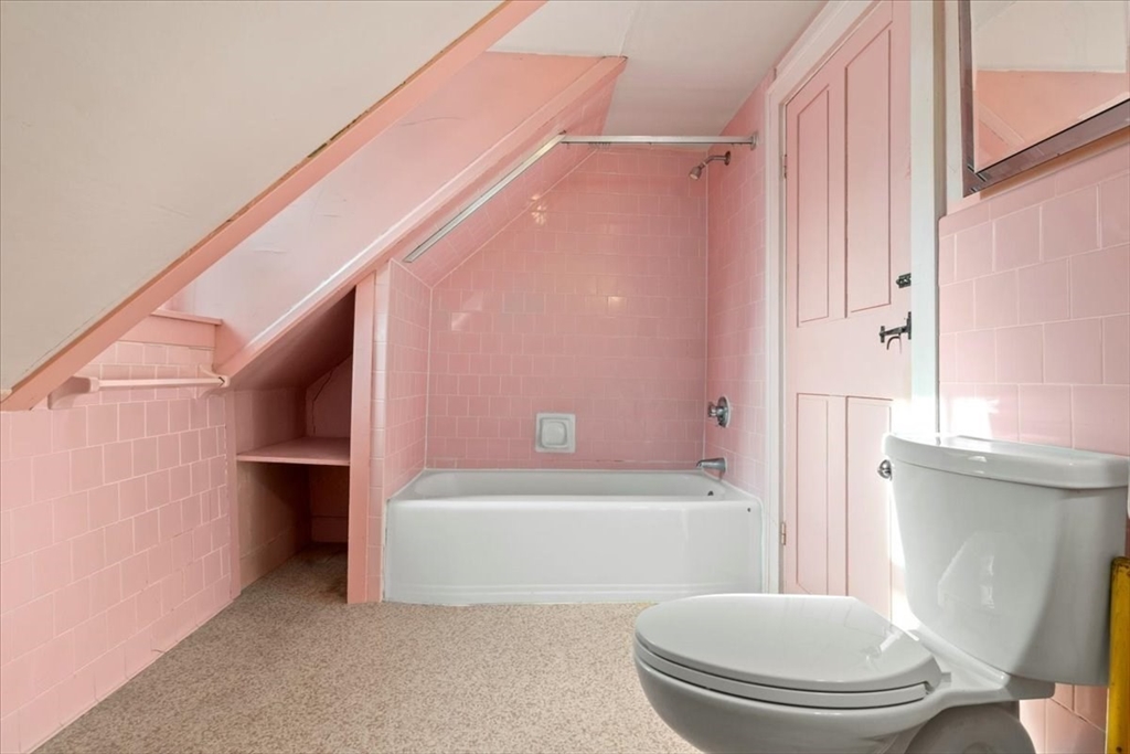 600 High Street Westwood, MA 02090 - Photo 20 of 27 a bathroom with a toilet and a bathtub