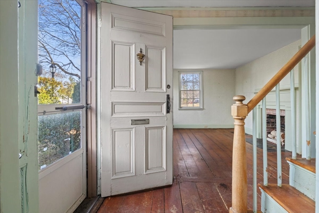 600 High Street Westwood, MA 02090 - Photo 2 of 27 a view of a hallway with wooden floor and entryway