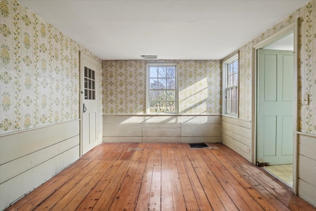 600 High Street Westwood, MA 02090 - Photo 6 of 27 a view of empty room with wooden floor and fan