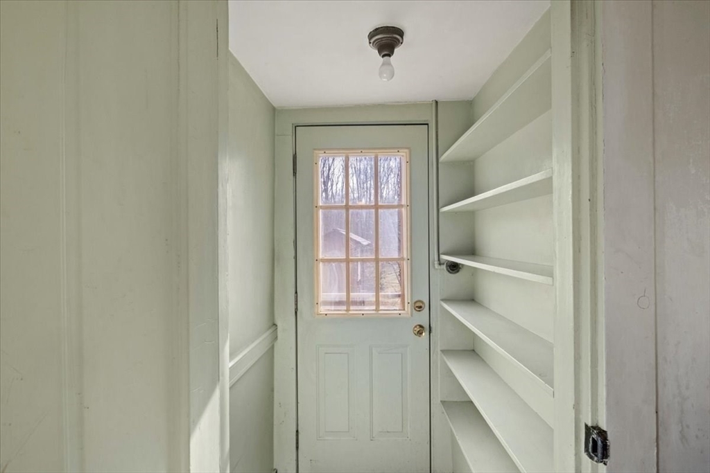 600 High Street Westwood, MA 02090 - Photo 9 of 27 a view of walk in closet with empty racks