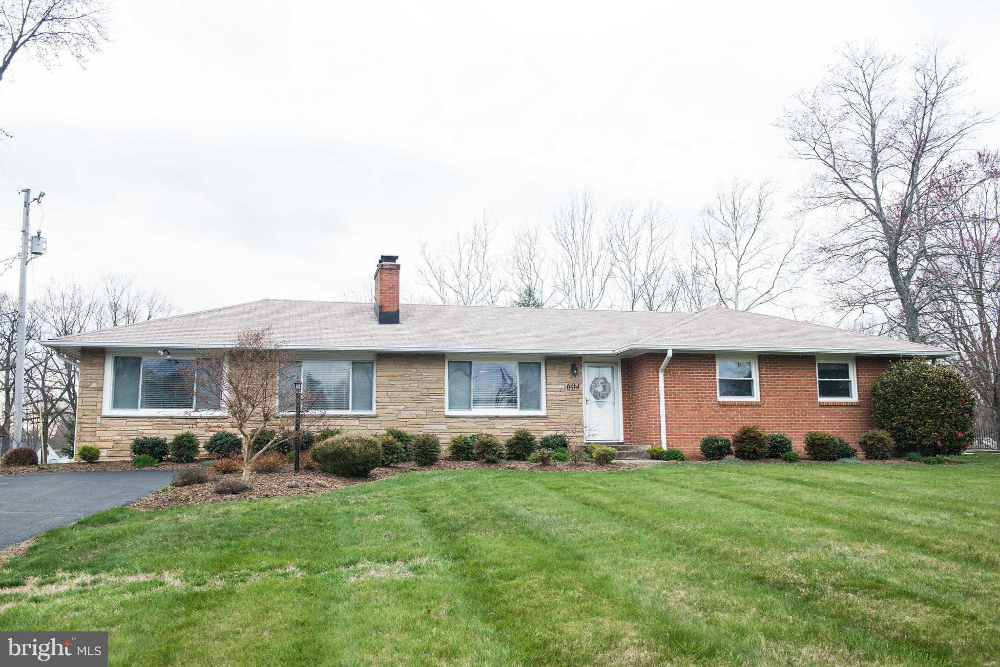 604 Bryan Point Road Accokeek, MD 20607 - Photo 1 of 29 a front view of house with yard and green space
