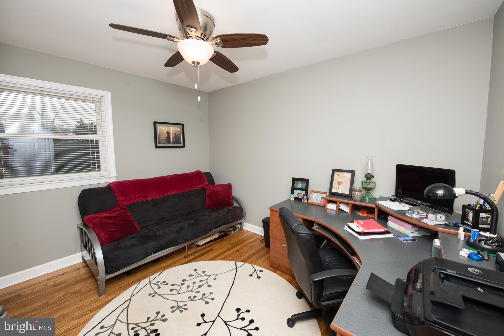 604 Bryan Point Road Accokeek, MD 20607 - Photo 18 of 29 a view of a workspace with furniture and a window