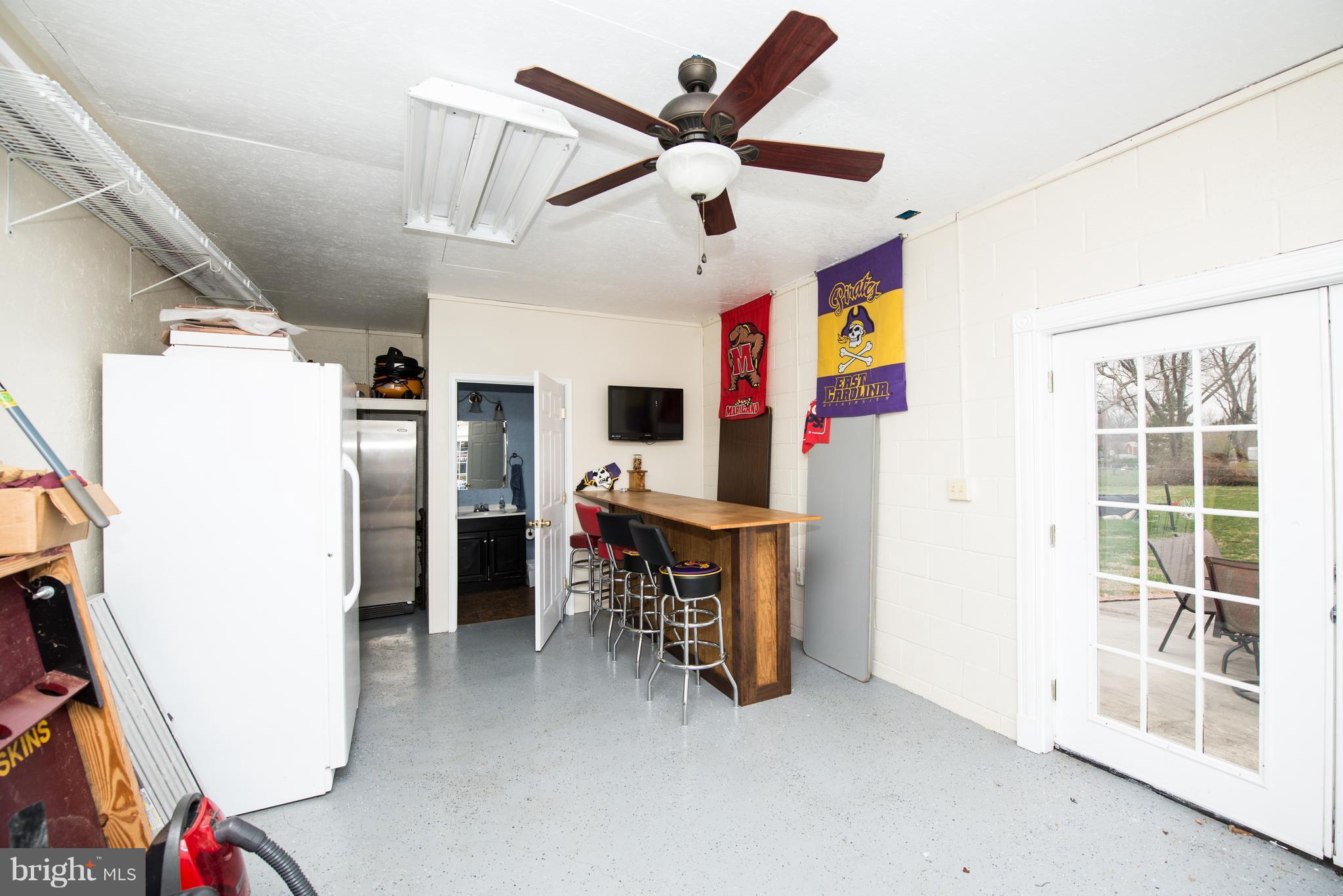 604 Bryan Point Road Accokeek, MD 20607 - Photo 25 of 29 a view of an empty room with window and furniture