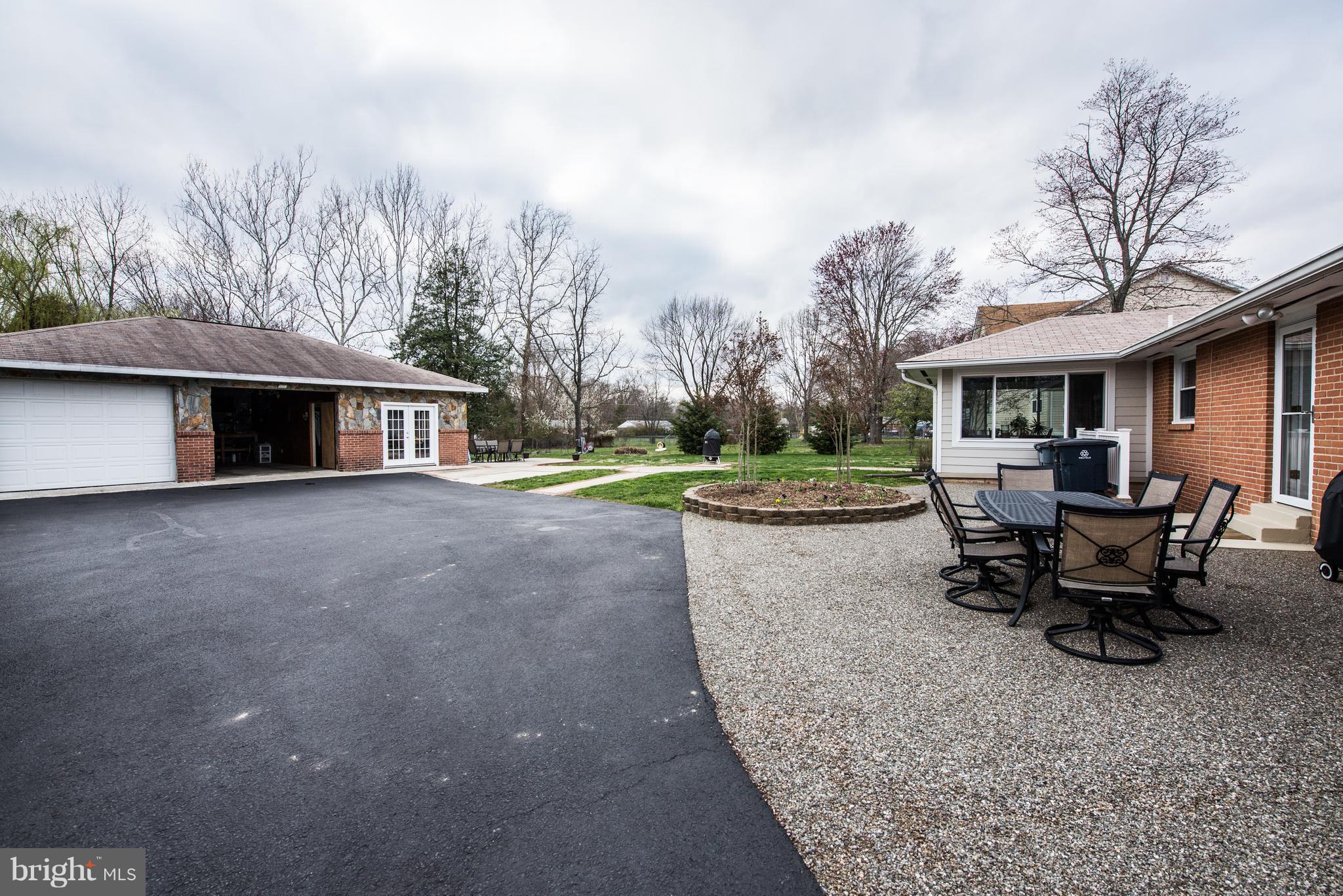 604 Bryan Point Road Accokeek, MD 20607 - Photo 27 of 29 a view of a house with backyard porch and sitting area