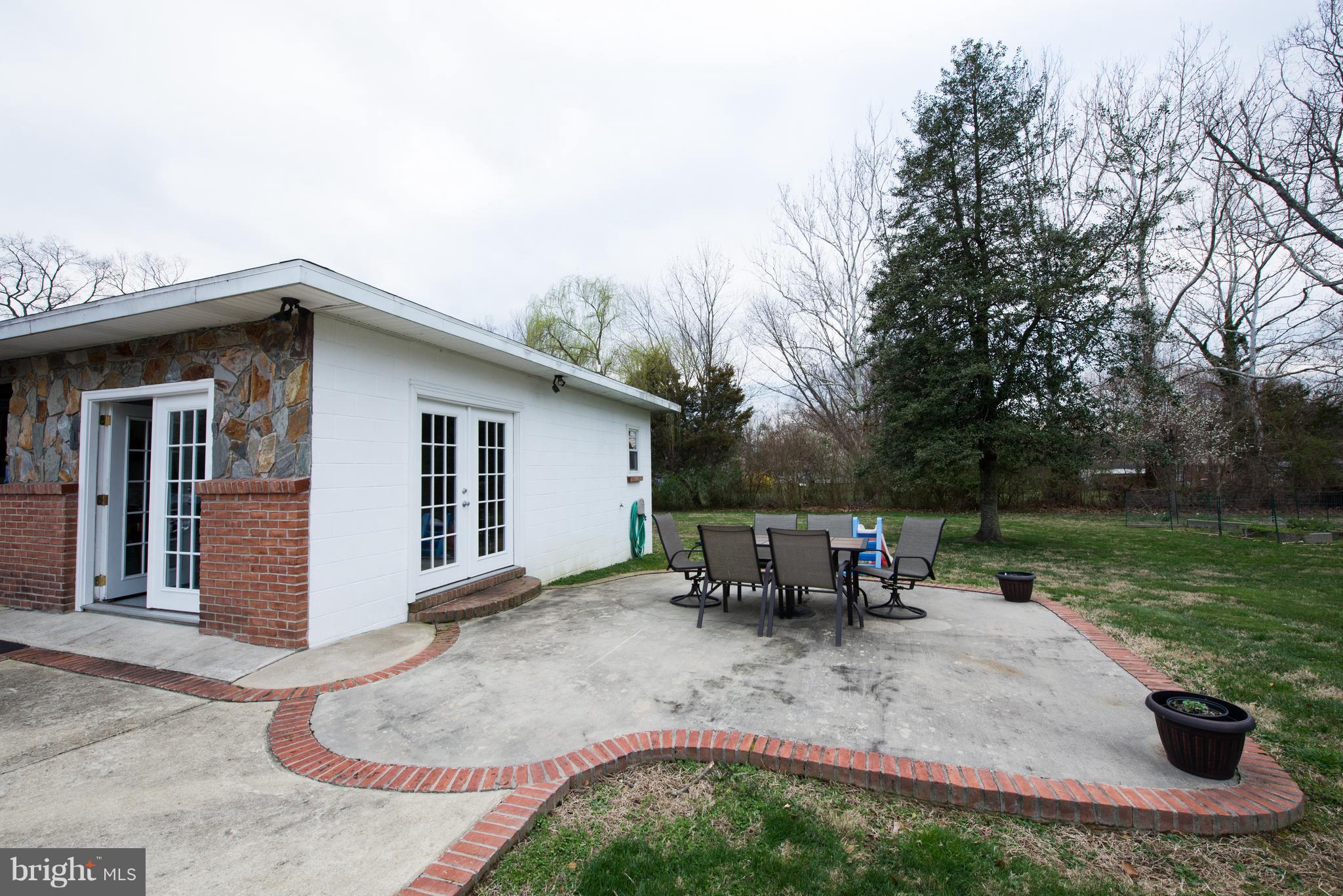 604 Bryan Point Road Accokeek, MD 20607 - Photo 29 of 29 a view of a house with backyard and sitting area