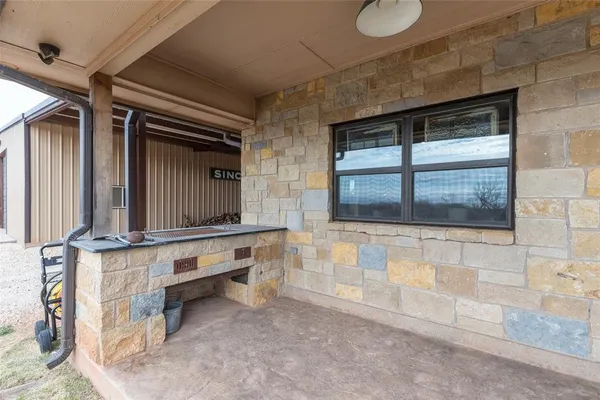 a view of a garage with furniture