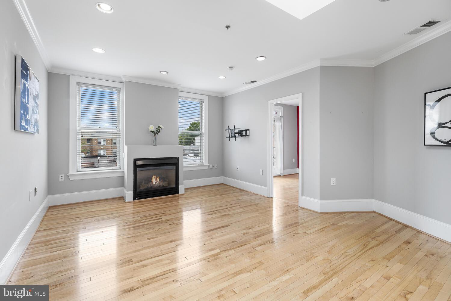 20 Logan Circle Northwest, Unit 32 Washington, DC 20005 - Photo 13 of 23 a view of a big room with wooden floor and windows