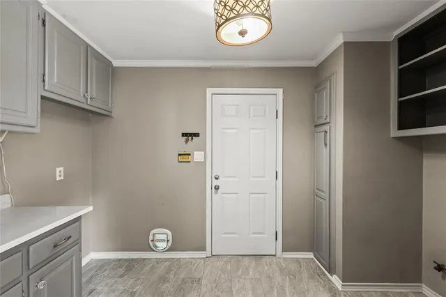 a large kitchen with stainless steel appliances granite countertop a stove and a sink