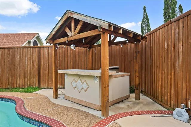 a view of roof deck with couch
