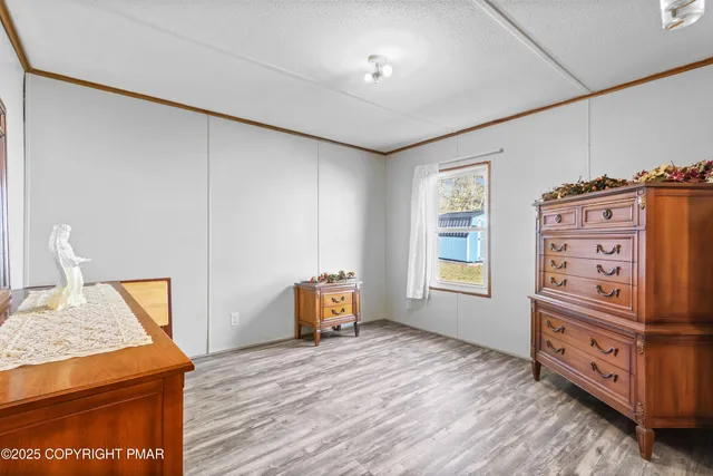 a view of workspace with furniture and window