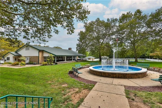 a table and chairs in a garden