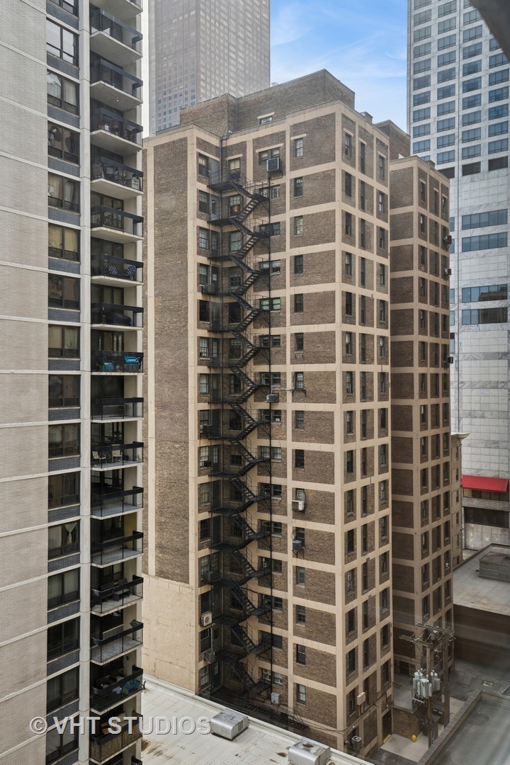 850 North Dewitt Place, Unit 11D Chicago, IL 60611 - Photo 12 of 15 a view of a building with a street