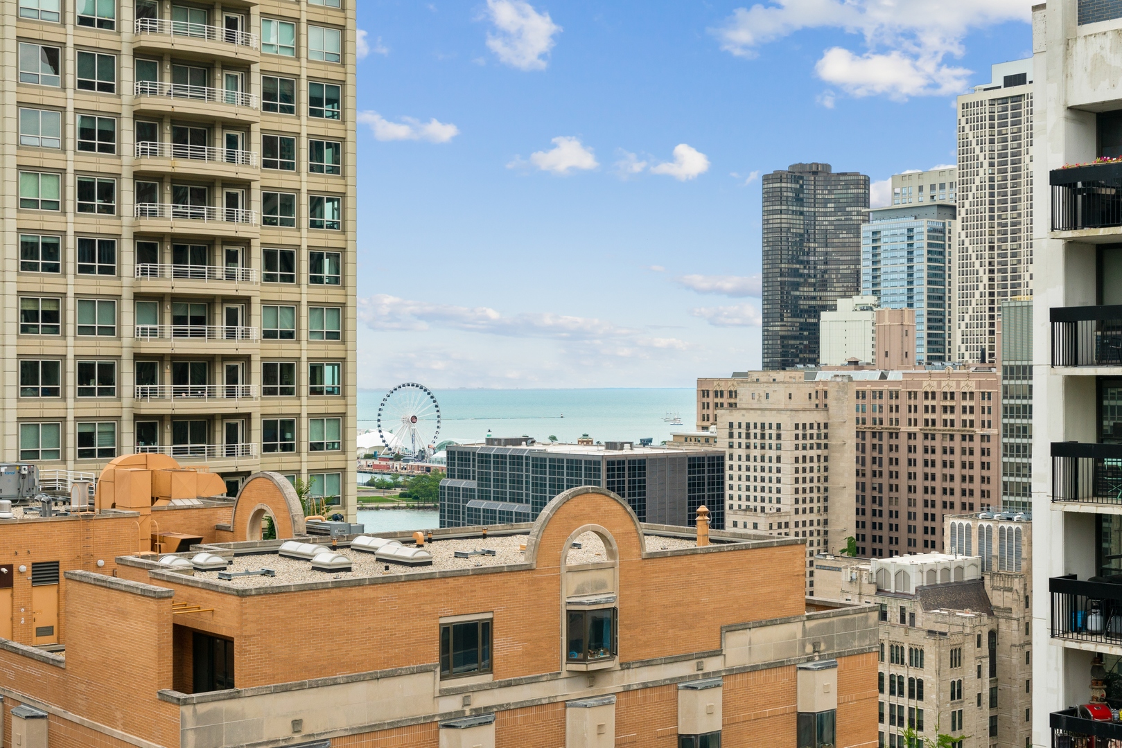 850 North Dewitt Place, Unit 11D Chicago, IL 60611 - Photo 13 of 15 a front view of a building with glass windows