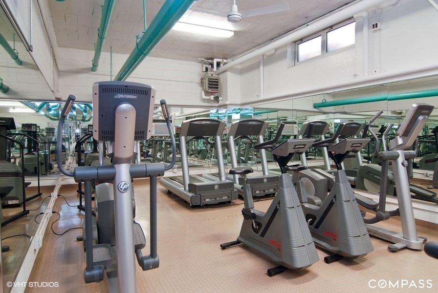 850 North Dewitt Place, Unit 11D Chicago, IL 60611 - Photo 14 of 15 a view of a room with gym equipment