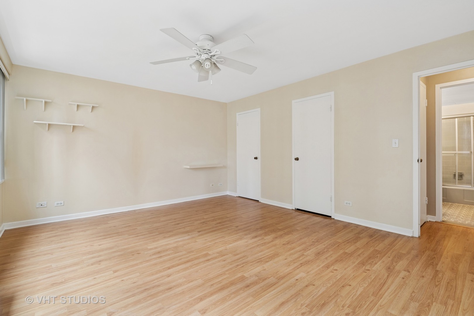 850 North Dewitt Place, Unit 11D Chicago, IL 60611 - Photo 8 of 15 a view of an empty room and wooden floor