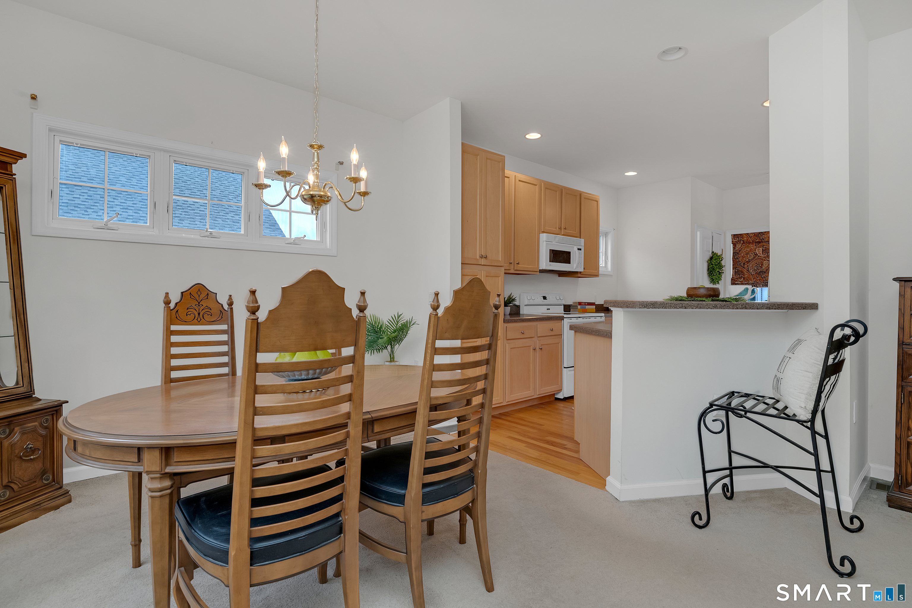 9 Pear Orchard Road, Unit 9 Portland, CT 06480 - Photo 13 of 38 a dining room with furniture and window